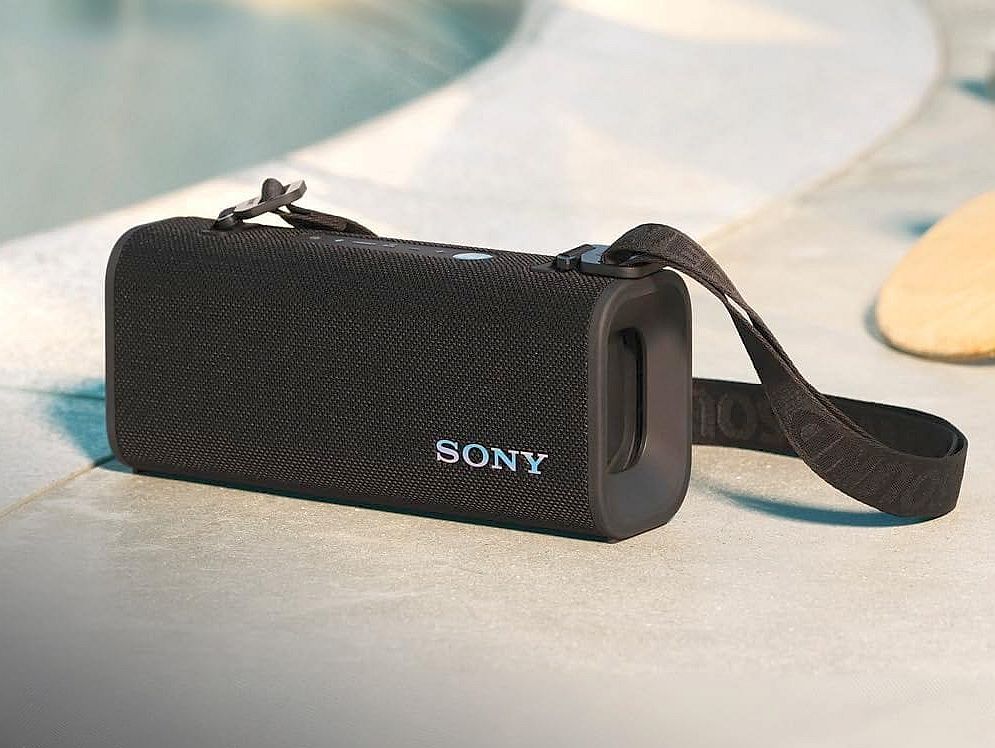 Compact, Rugged Design with Built‑In Strap