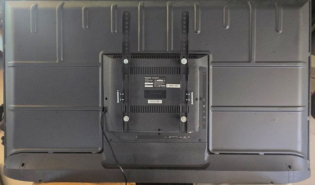 Repositioning the rails on the back of the TV