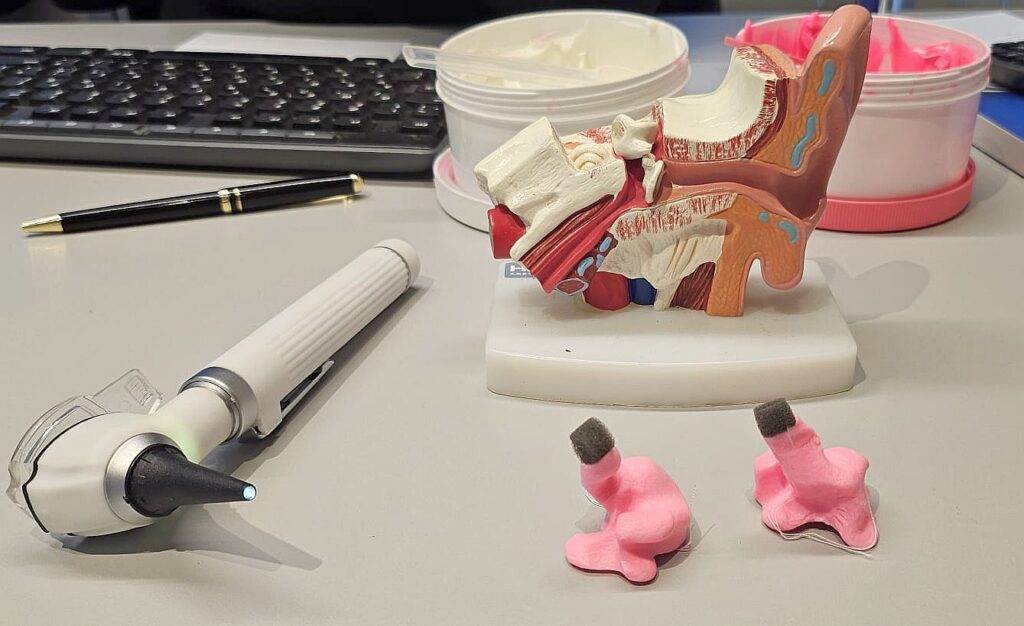 Ear impression made from two compounds