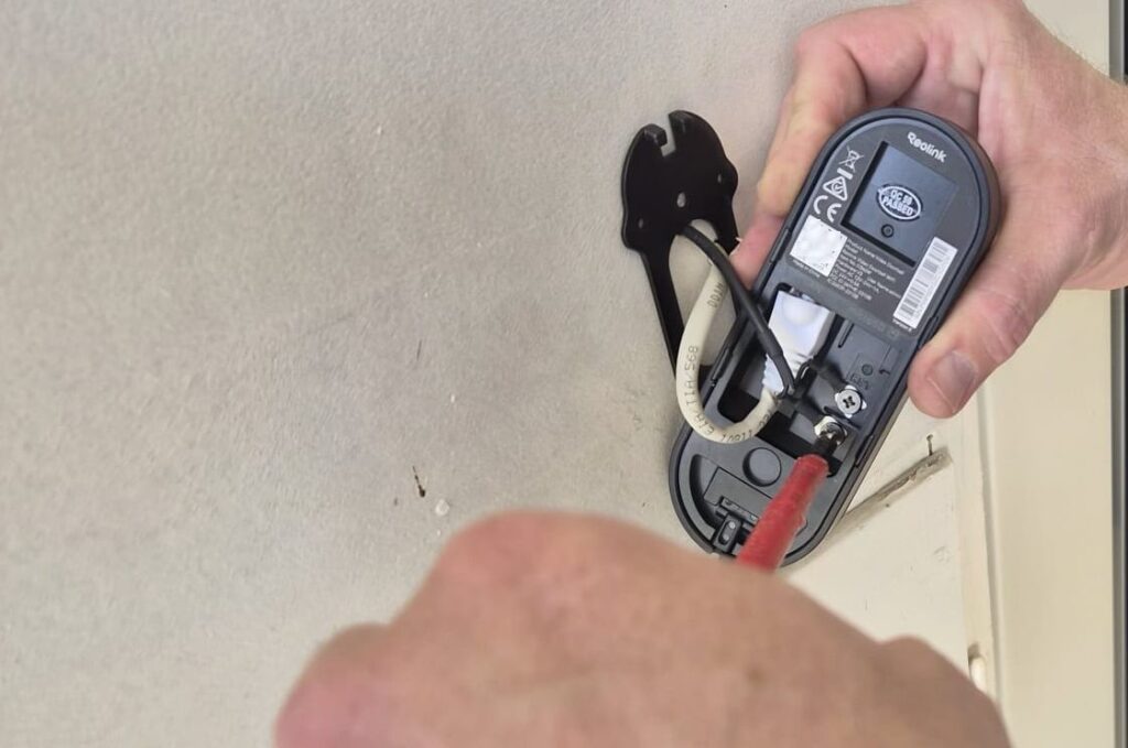 Securing the external unit to the wall