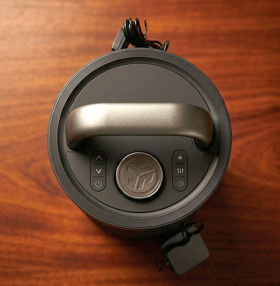 Buttons and metal handle on top