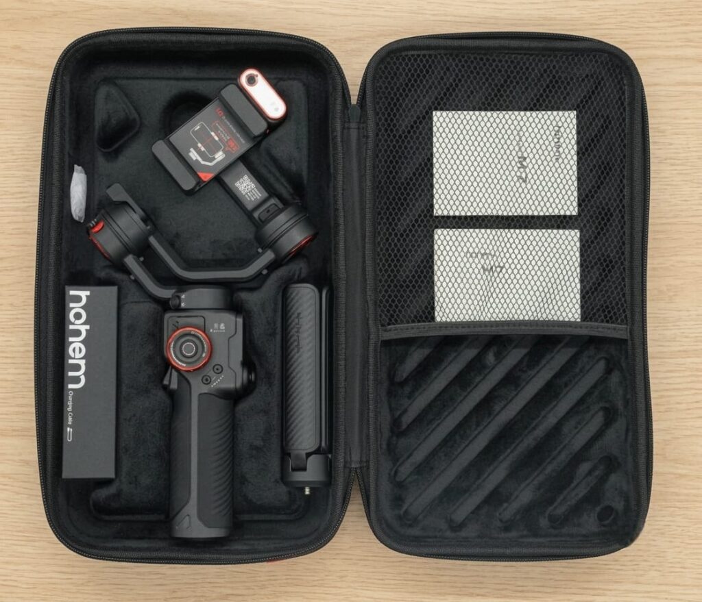 Hard carrying case is included