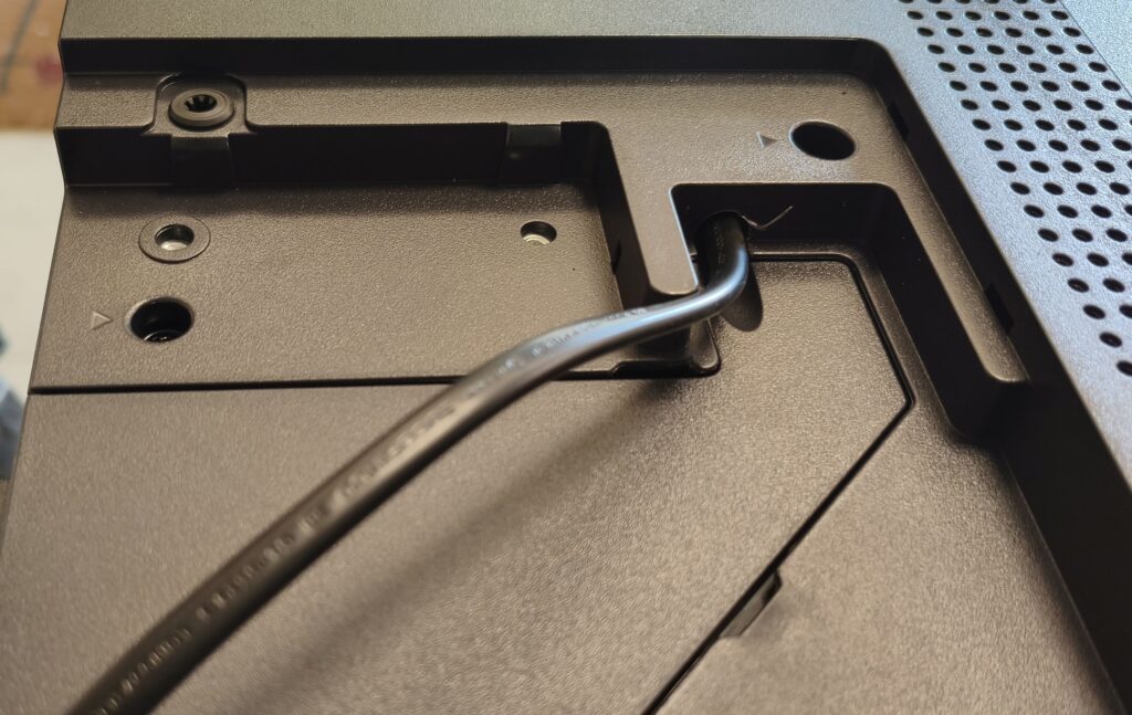 power cord remains permanently attached